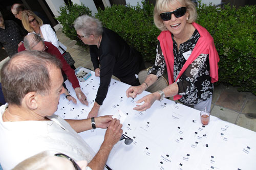 Jan Ambler, Diane Adler at table handing out name tags